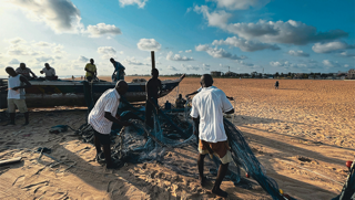 Fishers hauling in their nets